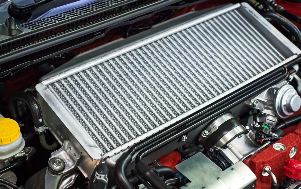 An up-close image of a vehicle radiator.