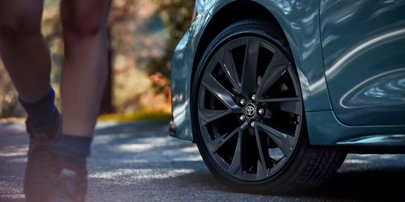 A close up on the front tires of a 2024 Toyota Corolla.