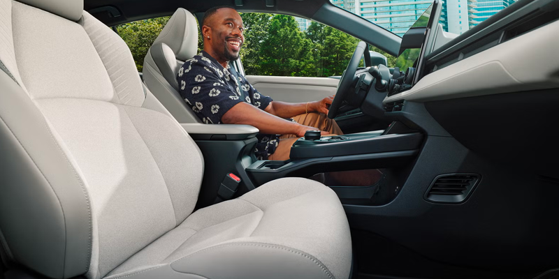 Driver behind the wheel of a Toyota